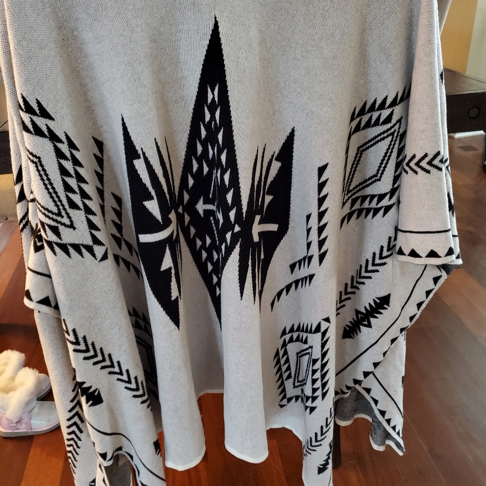 White and Black ruff hewn geometric cover up ponch